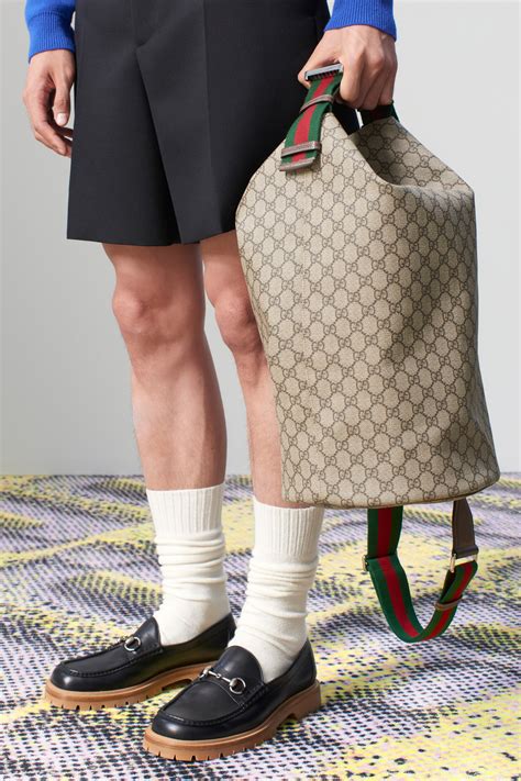 megan you tuberwith her gucci jacket and gucci bag|Gucci new bag 2024.